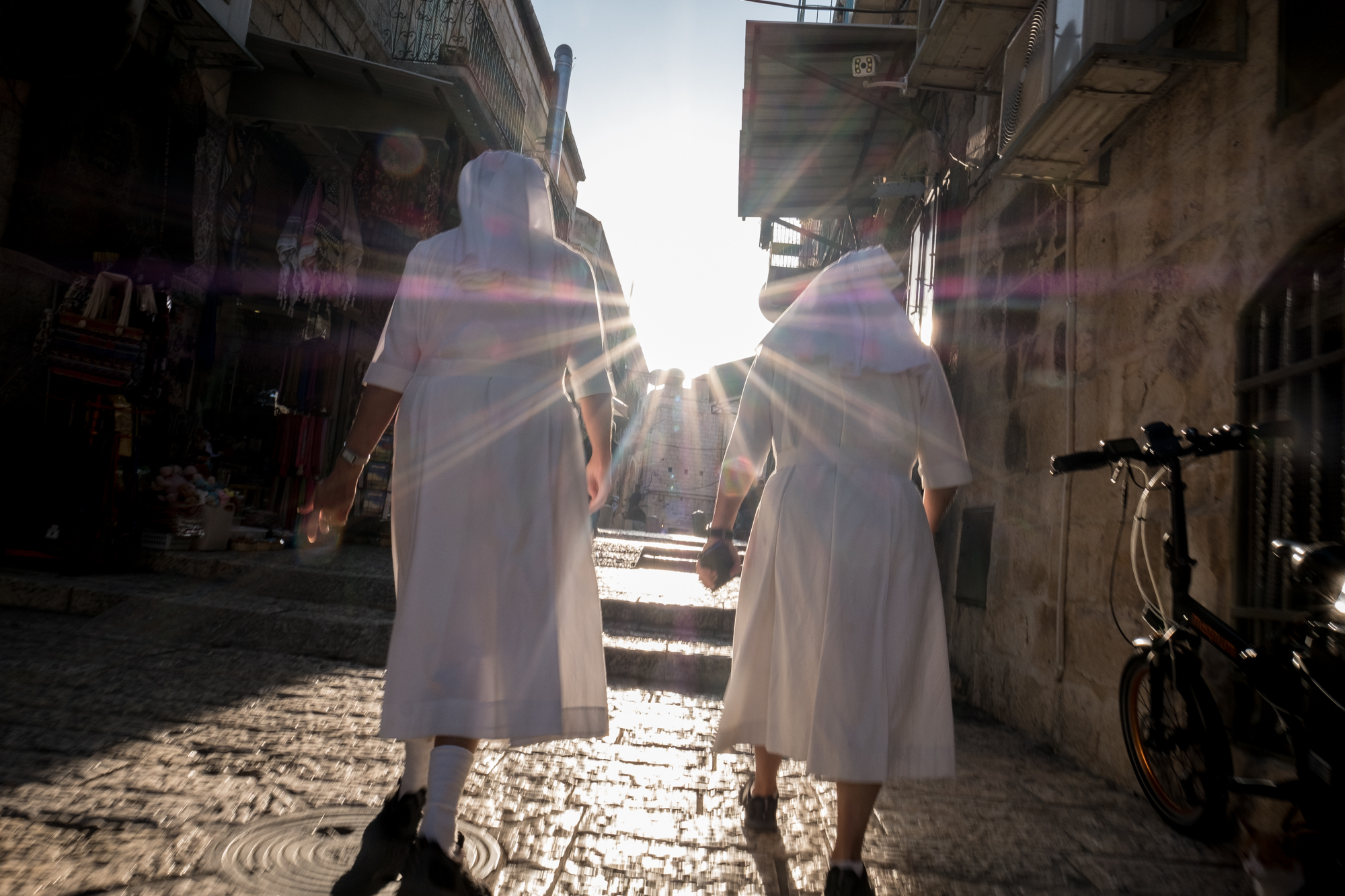 Two nuns walk through the Christian Quarter of Jerusalem's Old City.