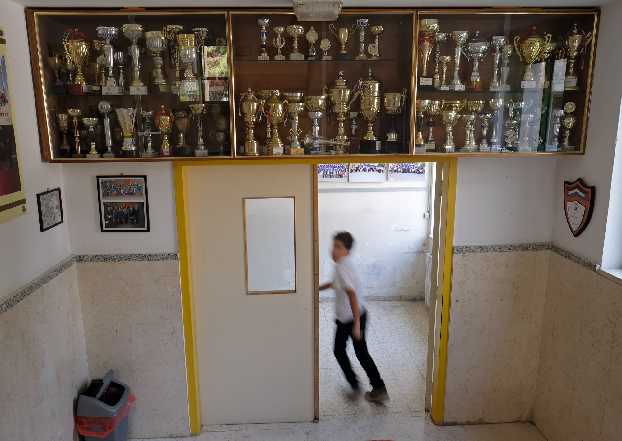 A student runs the halls of the Lutheran school in Beit Sahour.