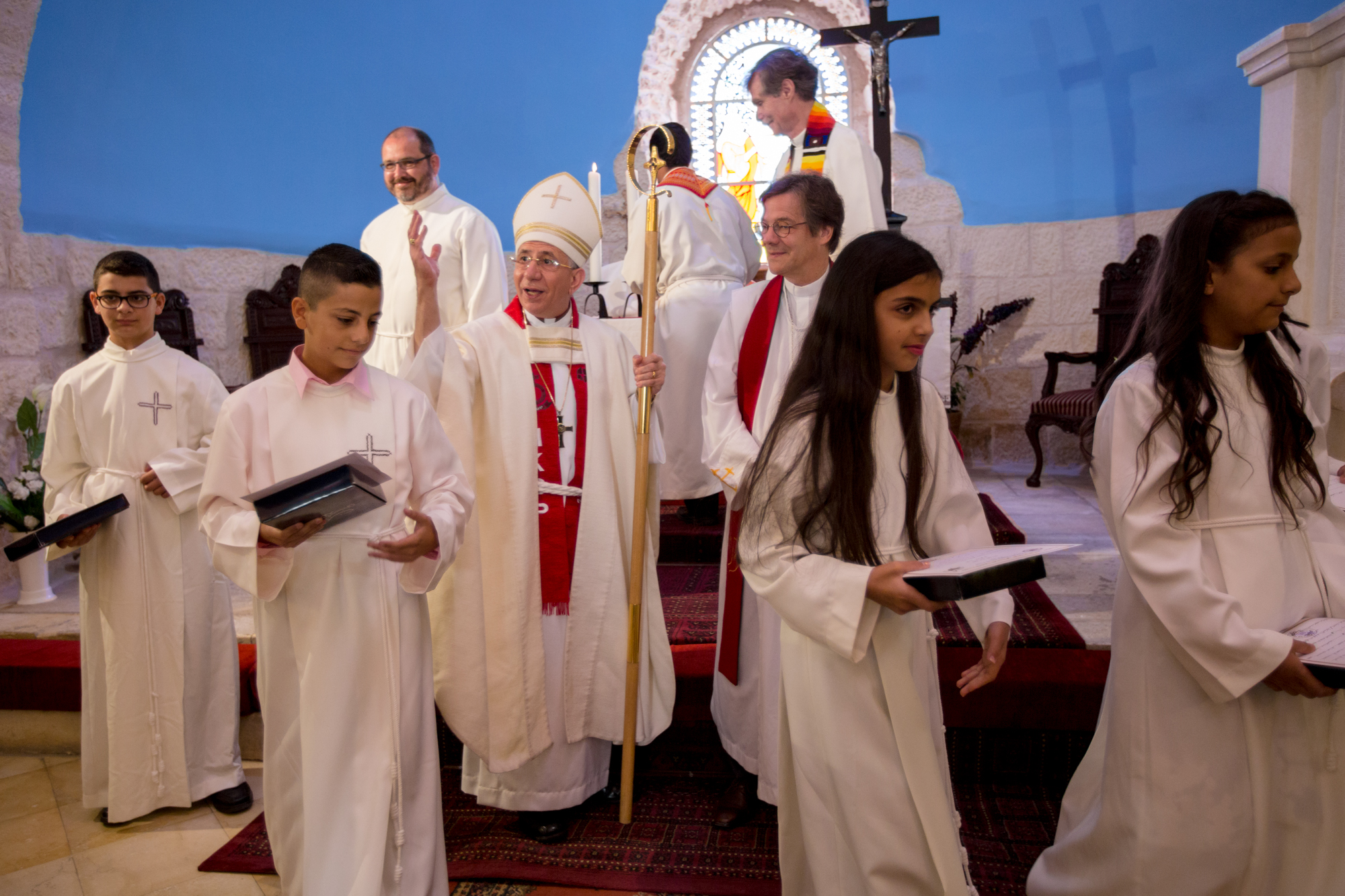 Bishop Dr. Munib Younan leads a confirmation service in Beit Jala.
